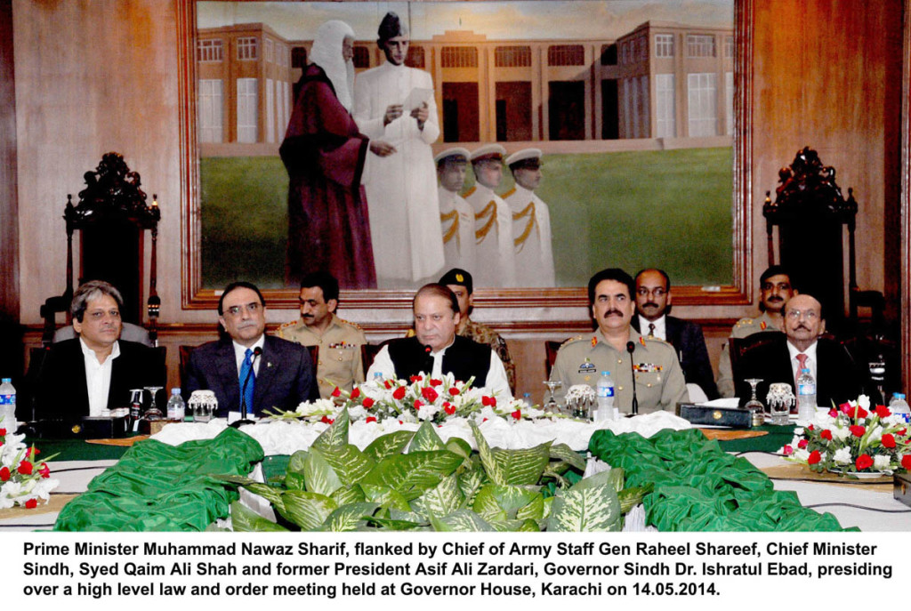 Prime Minister Muhammad Nawaz Sharif, flanked by Chief of Army Staff Gen Raheel Shareef, Chief Minister Sindh, Syed Qaim Ali Shah and former President Asif Ali Zardari, Governor Sindh Dr. Ishratul Ebad, presiding over a high level law and order meeting held at Governor House, Karachi.